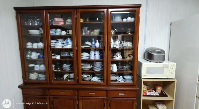 Кровать в общем номере Guest House Nakamura House
