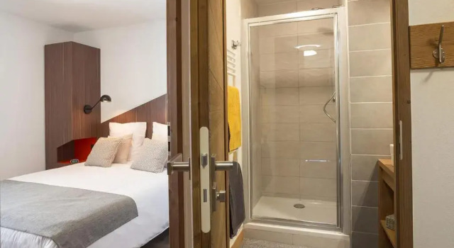 Кровать в общем номере с 2 комнатами Résidence Club MMV Les Chalets des Cimes