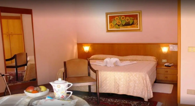 Четырёхместный номер Standard Hotel Rigoletto