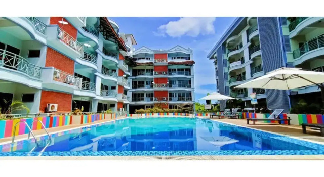 Кровать в общем номере с 2 комнатами Perdana Serviced Apartment & Resorts