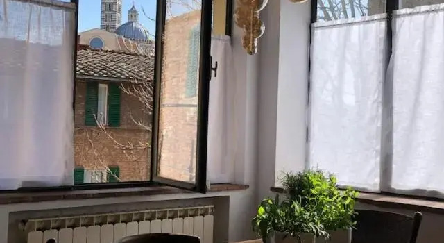 Teresa 91, appartamento incantevole con camino, Забронировать Апартаменты/квартира Апартаменты Сиены, рядом с Национальная картинная галерея Сиены, Апартаменты/квартира