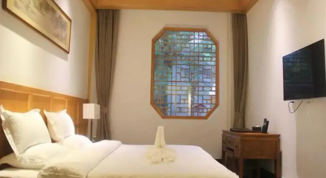 Four Seasons Inn Zhujiang Hot Spring, Book Pension Hoteller i Beijing Province med parkering, Parkering