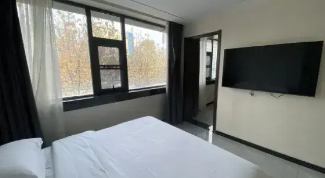 Двухместный люкс Hengyi Hotel (Railway Station Store of Dashu Camp, Renmin East Road, Kunming)