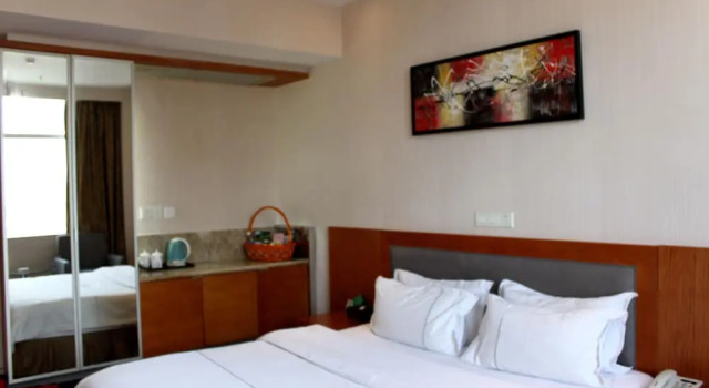 Двухместный номер Deluxe Huangpu Hotel