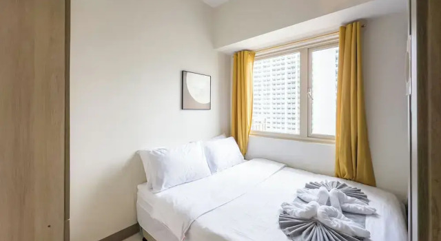 Номер Standard c 1 комнатой с балконом и с видом на залив Coasis at SMDC Coast Residences