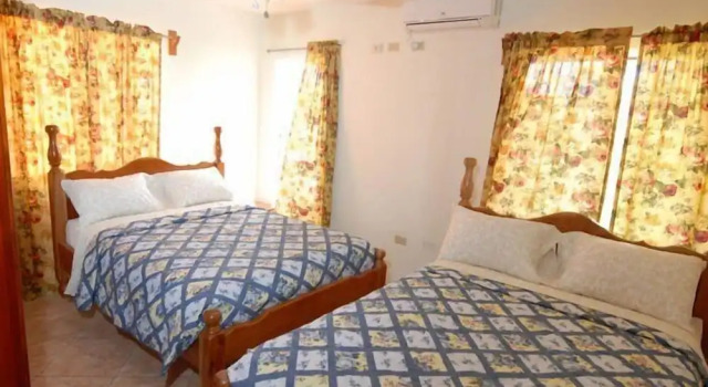 Апартаменты Deluxe J&G's Tropical Apartments