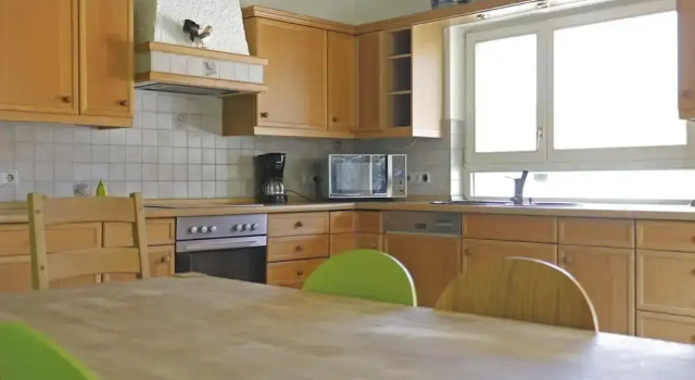 Кровать в общем номере с 6 комнатами Charmante Wohnung mit eigener Terrasse