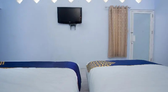 Standard triple chambre avec balcon SPOT ON 3119 Hotel Kurnia