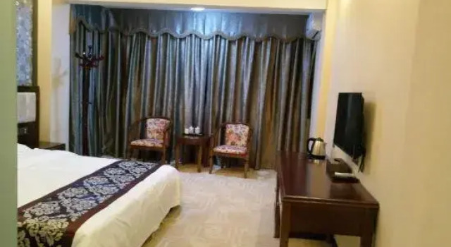 Люкс Business Huaqiangu Hotel