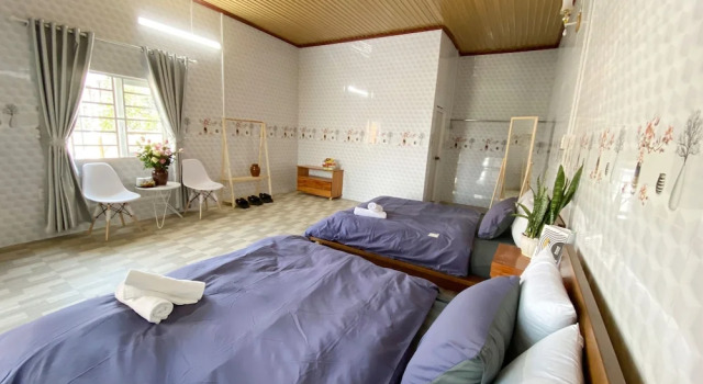 Трёхместный семейный номер Standard с видом на сад HOMESTAY THÙY DƯƠNG