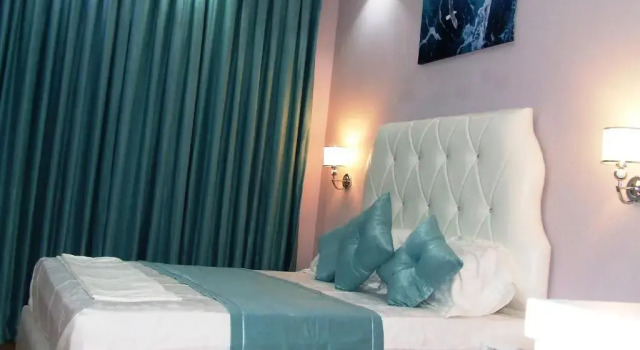 Трёхместный номер Deluxe с балконом Apartments Flower Residence