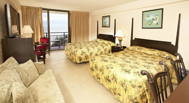 Daytona Beach Hawaiian Inn, Забронировать Курортный отель Курортные отели Дейтона-Бич, Курортный отель