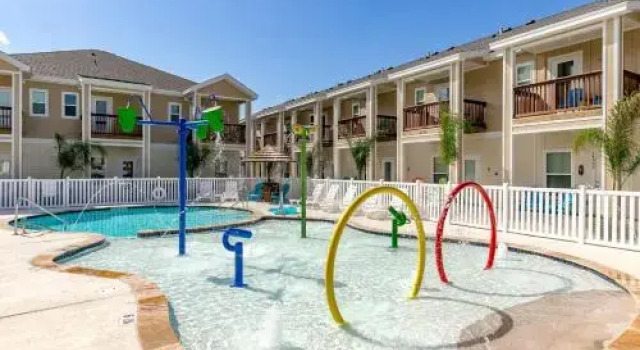 Village by the Beach I910 by RedAwning, Book Lejlighed Padre Island USA