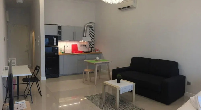 Люкс с балконом и с видом на сад Borneo Coastal Residence @ IMAGO Mall