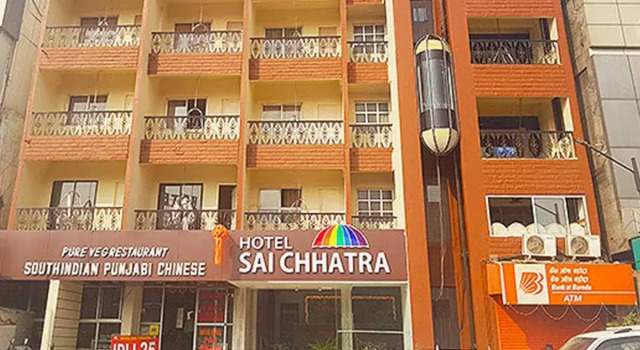 Кровать в общем номере Hotel Sai Chhatra