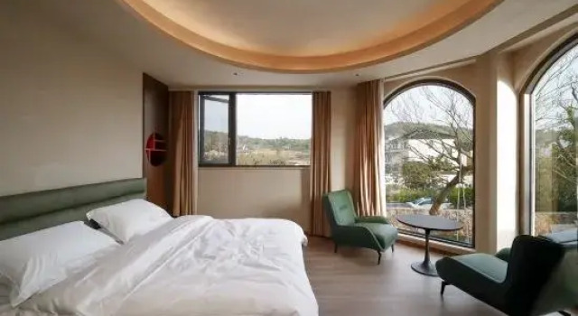 Кровать в общем номере Dongshan Sheyi Homestay