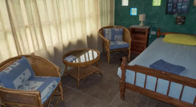Cama en dormitorio compartido Casa Chueca - DiVino