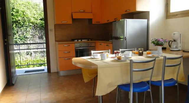 Апартаменты с 2 комнатами с балконом и с видом на море Residence La Carruba