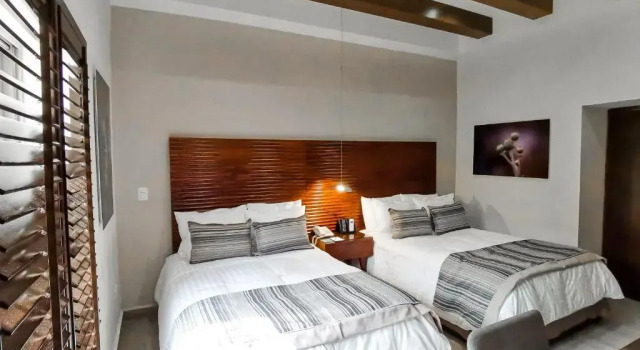 Четырёхместный номер Superior Hotel Plaza Cuatro Ciénegas