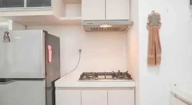 Homey and Modern 2BR at Signature Park Grande Apartment By Travelio, Book Apartment Jakarta Jakarta Province