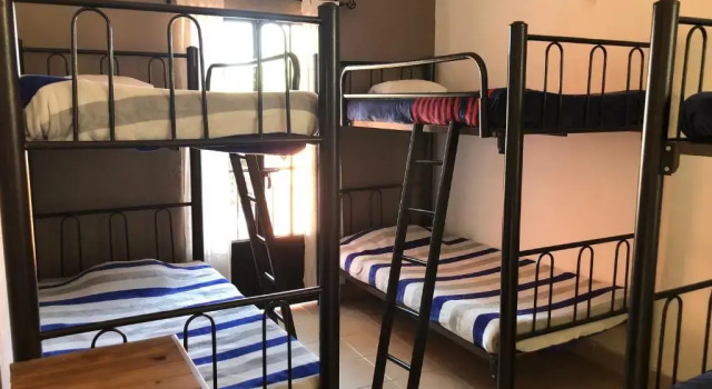 Кровать в общем номере Hostel Inn