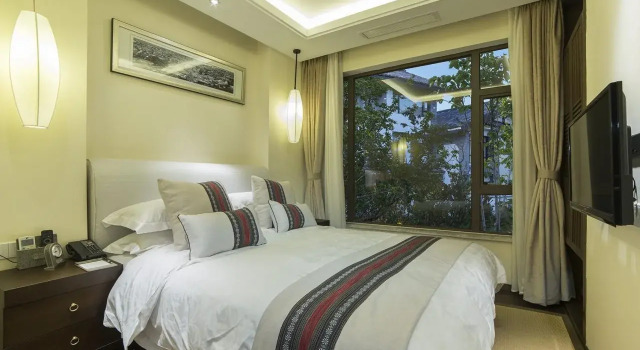 Lijiang Patio Luxury Hotel and Resort, Prenota Resort Hotel resort a Lijiang, Resort
