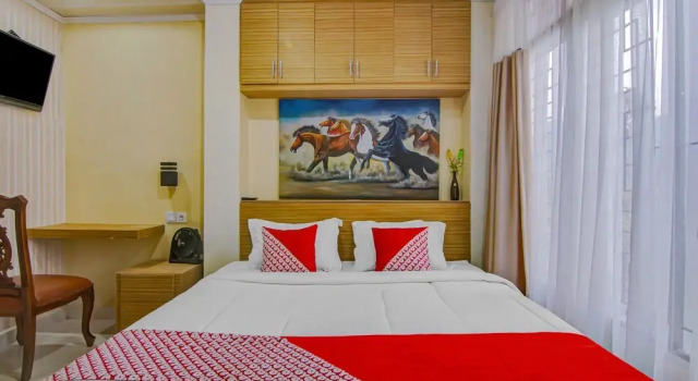 Студия Deluxe Reddoorz Syariah near tirtasari sonsang dan banto royo