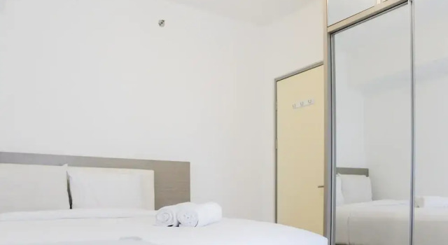 Minimalist 2BR Apartment near Mall at M-Town Residence By Travelio