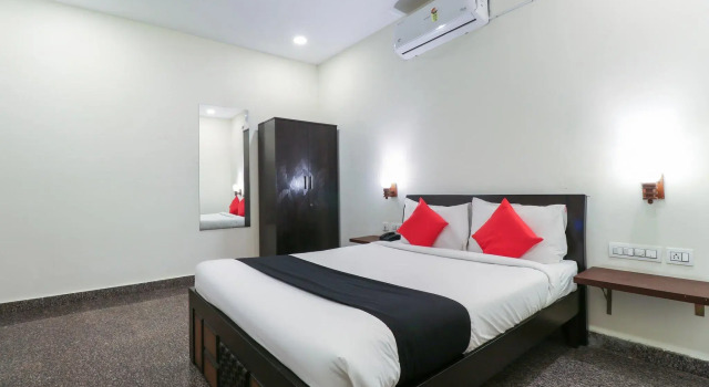 Capital O GN Suites, Забронировать Отель Недорогие отели штата Карнатаки, недорого