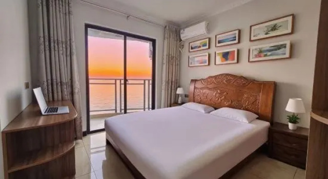 Люкс с 4 комнатами с красивым видом из окна Woniu Lvdou Scenic Apartment (Beibuwan No. 1)