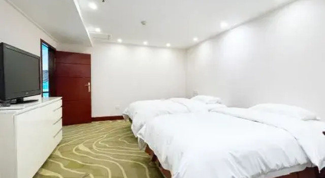 Семейный люкс Deluxe Дуплекс с 2 комнатами с красивым видом из окна Guangxi Wharton International Hotel