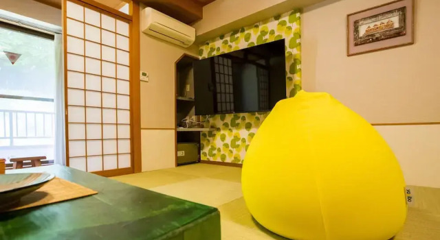 Кровать в общем номере Mashikokan Satoyama Resort Hotel