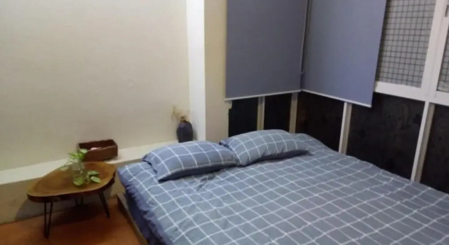 Кровать в общем номере Green Homestay
