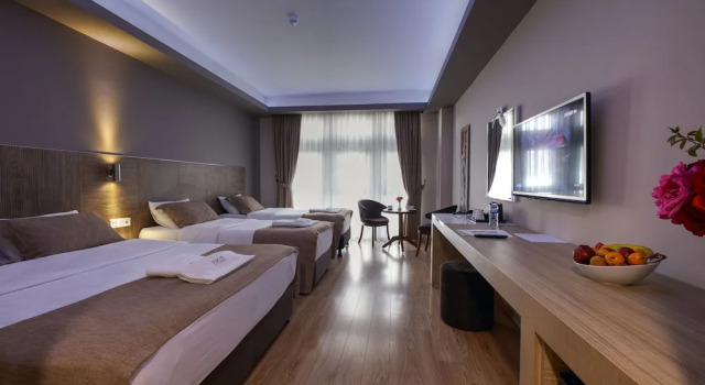 Четырёхместный семейный номер Standard Arus Hotel
