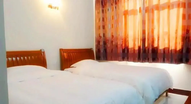 Longmen Hengtong Motel, Rezervovat Motel Longmen Henan