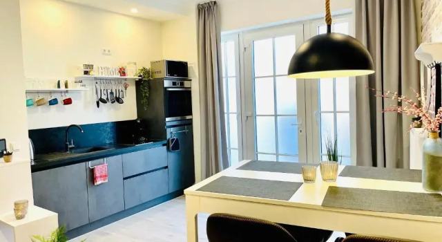 Апартаменты Цокольный этаж Schöne Ferienwohnungen teilweise mit Dachterrasse im Herzen von Itzehoe