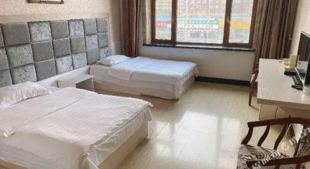 Huadu Business Inn, Prenota Hotel Qian'an Cina