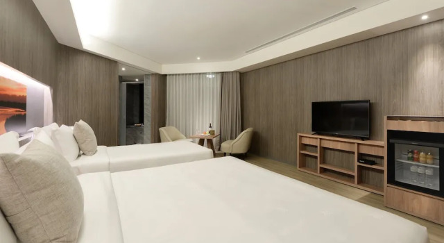 Трёхместный номер Deluxe с балконом Cuncyue Hot Spring Resort