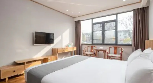 Семейный люкс Deluxe с красивым видом из окна Wangxia Homestay (Jiuhuashan Transfer Center)