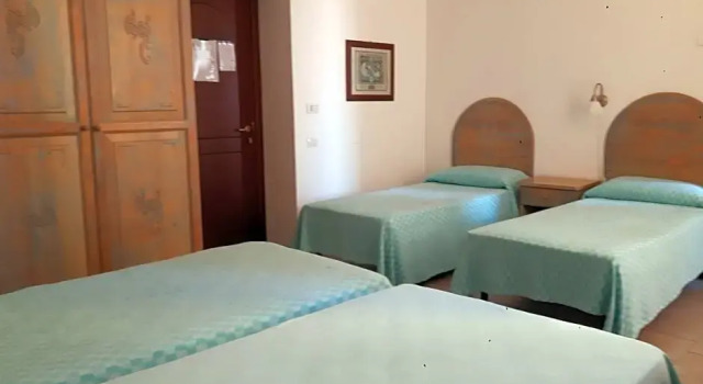 Четырёхместный номер Alghero Vacanze Hotel