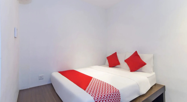 OYO 128 Mutiara Suites, Забронировать Отель Джаандак Джакарта, рядом с Хаджи Нави