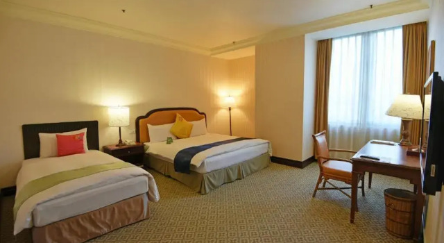 Трёхместный номер Standard с красивым видом из окна Wei-Yat Grand Hotel