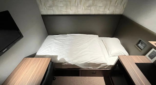 Кровать в общем номере (мужской номер) Tanegashima Araki Hotel