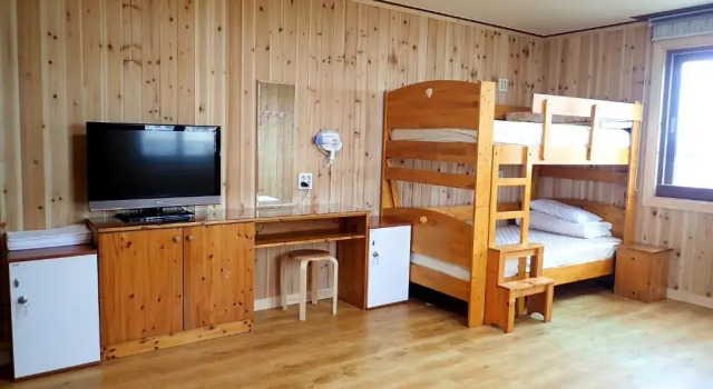 Кровать в общем номере Galeum Guesthouse