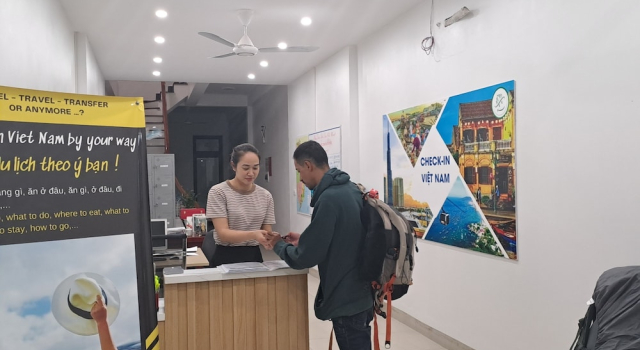 Кровать в общем номере HT Airport Inn