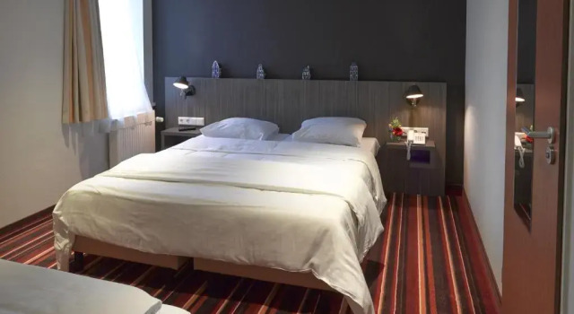 Трёхместный номер Mozart Hotel