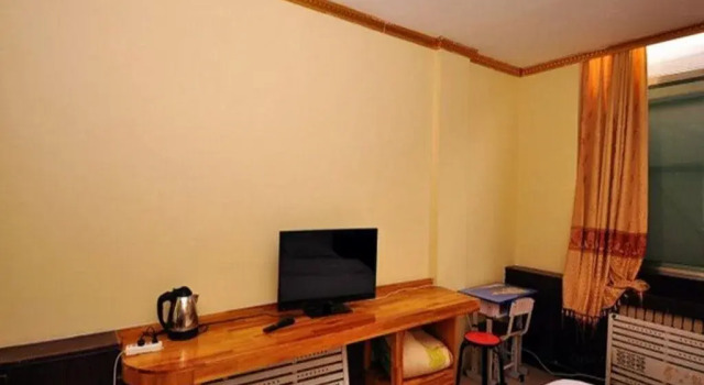 Qihe Pengsheng Hotel, Book Hotel Hoteller i Qihe med parkering, Parkering