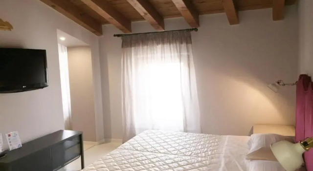 Четырёхместный номер Superior Hotel Gattopardo