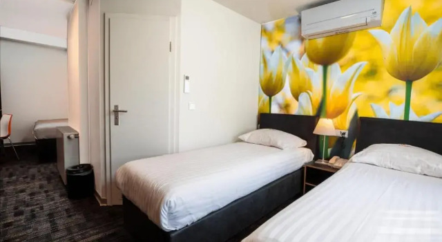 Четырёхместный номер Standard Multatuli Hotel