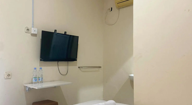 CK Homestay Syariah near Lippo Plaza Jambi, Rezerwuj Hotel Hotele w Paalmerah z parkingiem, Parking